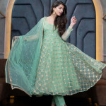 Green and gold-toned embroidered semi-stitched dress material